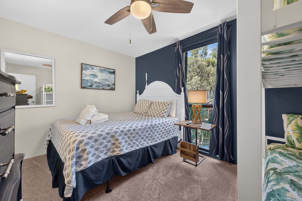 Beach access condo with deck, pool, washer dryer, and AC - snowbird-friendly