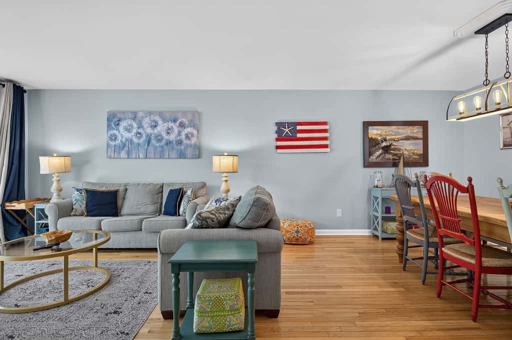 Beach access condo with deck, pool, washer dryer, and AC - snowbird-friendly