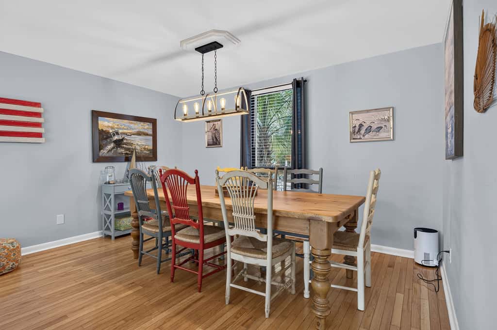 Beach access condo with deck, pool, washer dryer, and AC - snowbird-friendly