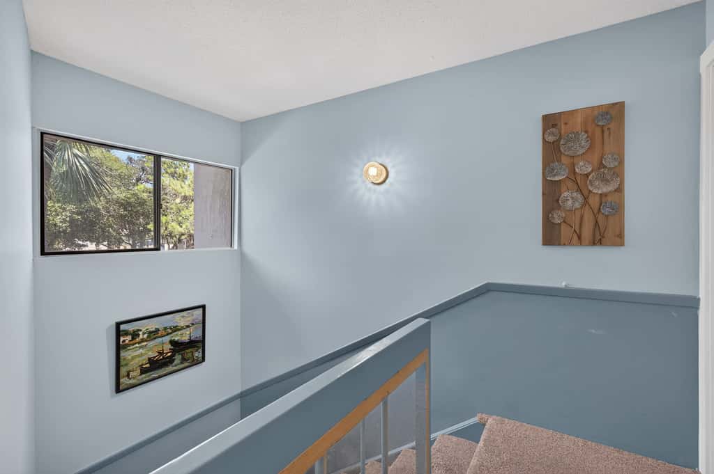 Beach access condo with deck, pool, washer dryer, and AC - snowbird-friendly