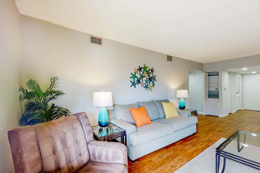 Dog friendly coastal condo  water views, balcony, WD, & AC