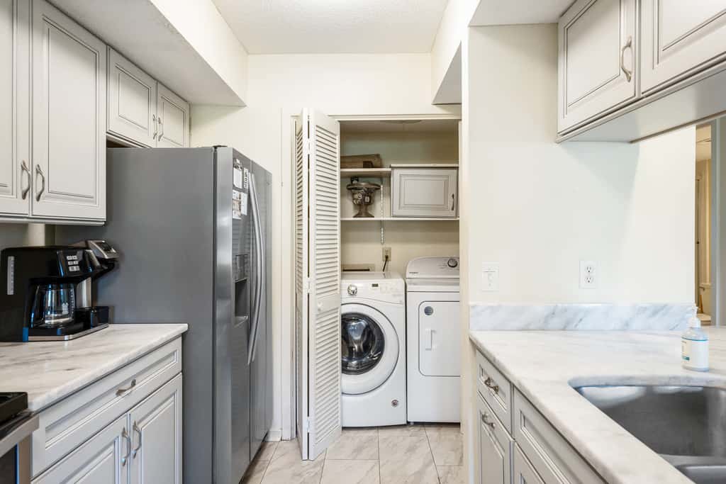 Golf course-view condo near beach with pool & private deck - dog-friendly