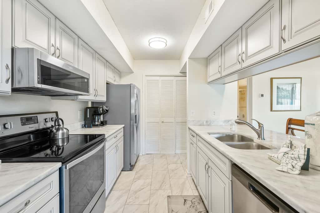 Golf course-view condo near beach with pool & private deck - dog-friendly