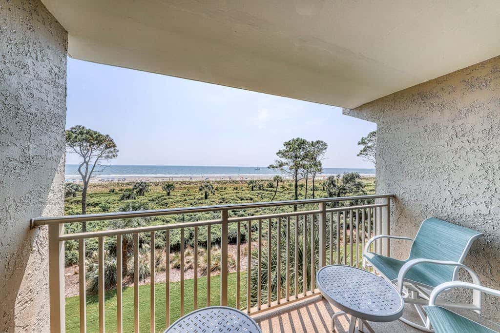 Updated beach gem with ocean views, pool, hot tub, & tennis - snowbird-friendly