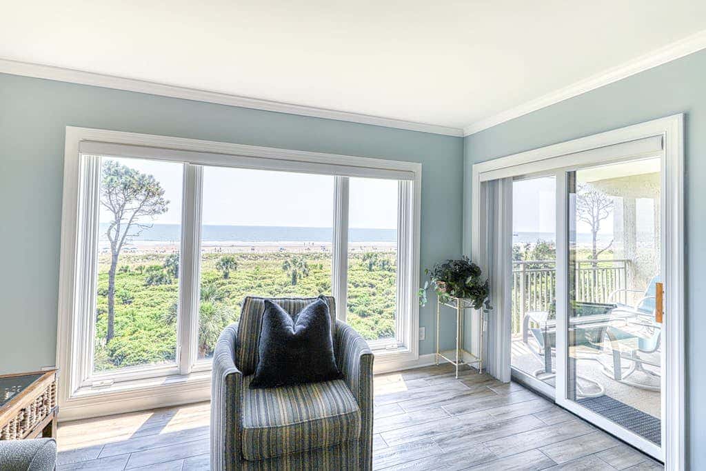 Updated beach gem with ocean views, pool, hot tub, & tennis - snowbird-friendly