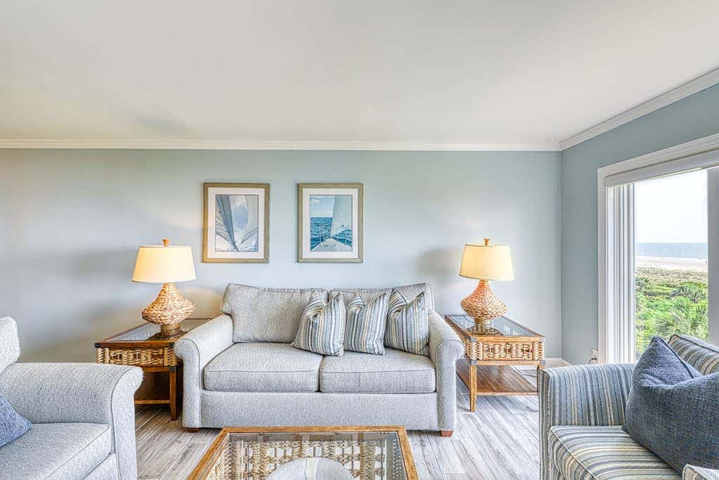 Updated beach gem with ocean views, pool, hot tub, & tennis - snowbird-friendly