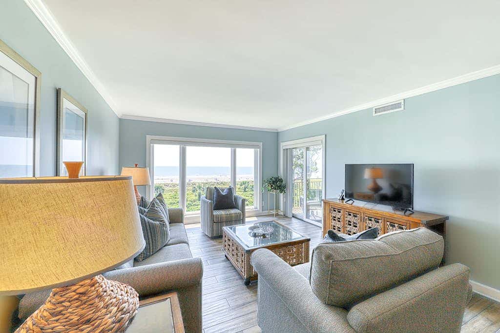 Updated beach gem with ocean views, pool, hot tub, & tennis - snowbird-friendly