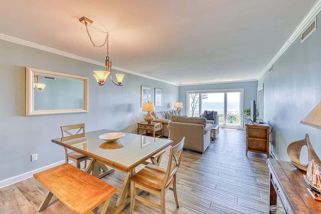 Updated beach gem with ocean views, pool, hot tub, & tennis - snowbird-friendly