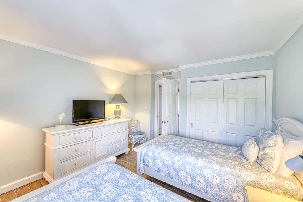 Updated beach gem with ocean views, pool, hot tub, & tennis - snowbird-friendly