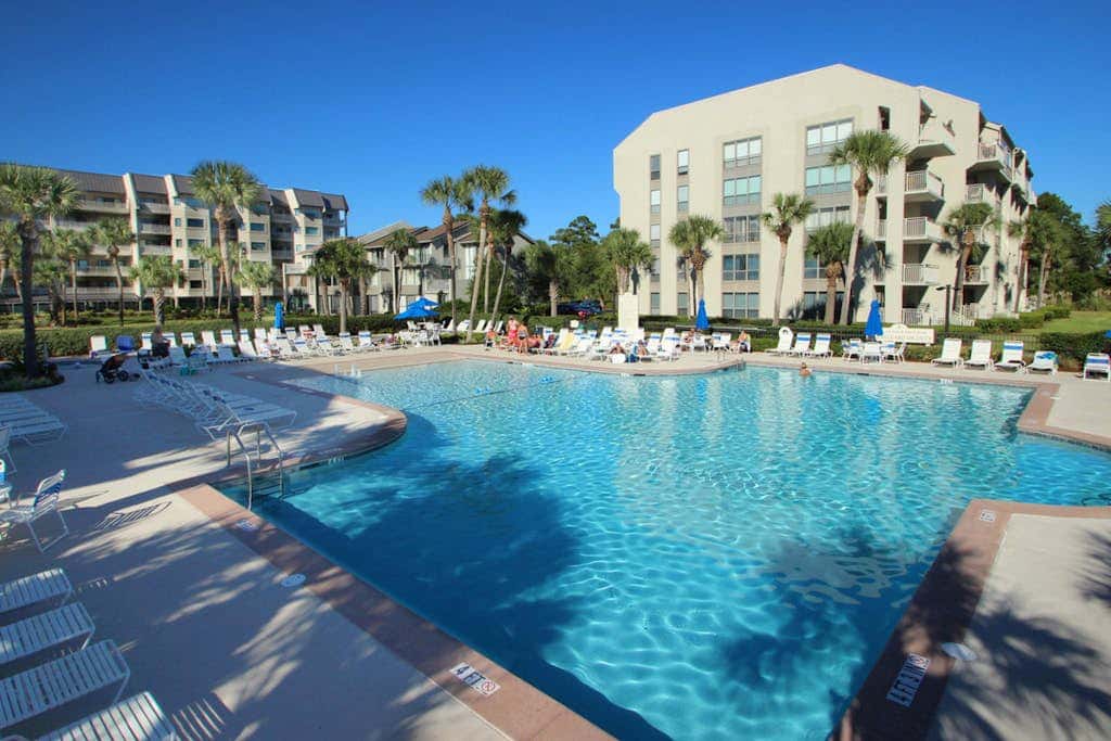 Updated beach gem with ocean views, pool, hot tub, & tennis - snowbird-friendly