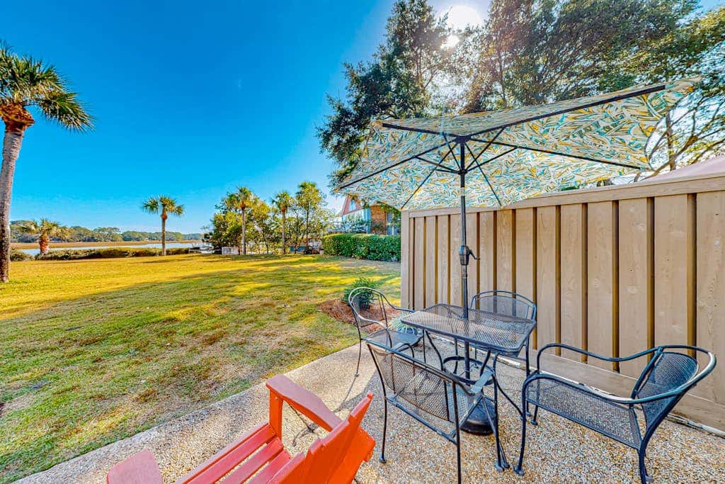 Charming Ground Floor studio condo near beach with tennis, pickleball, & water views
