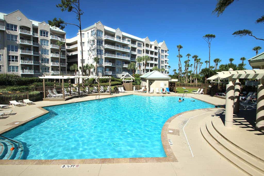Stunning beach condo with two ocean-view balconies, shared pool & hot tub