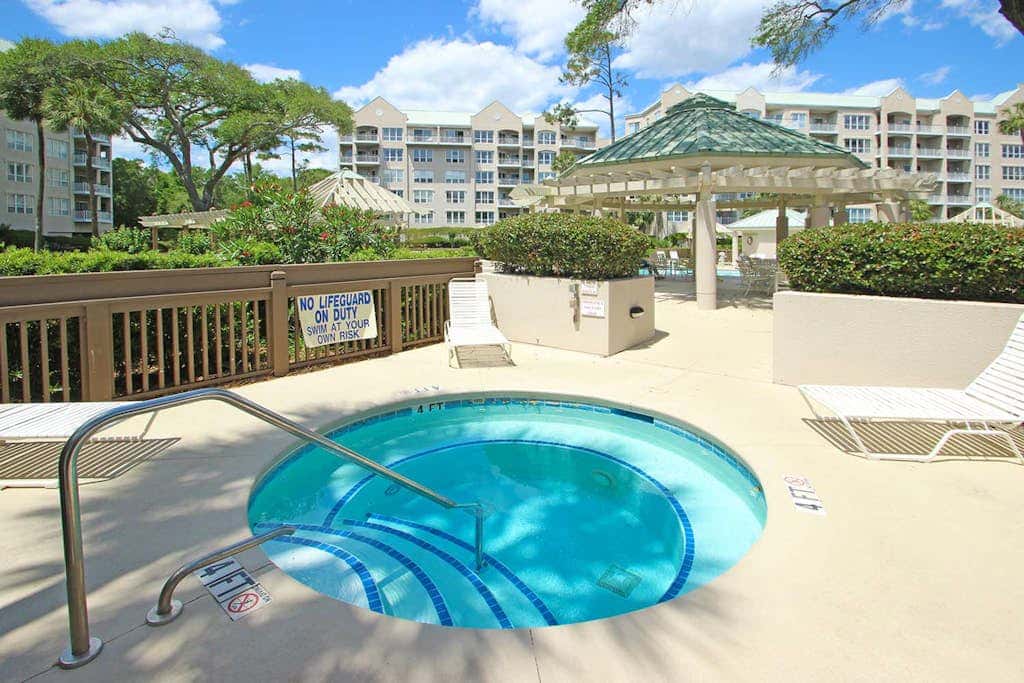 Stunning beach condo with two ocean-view balconies, shared pool & hot tub