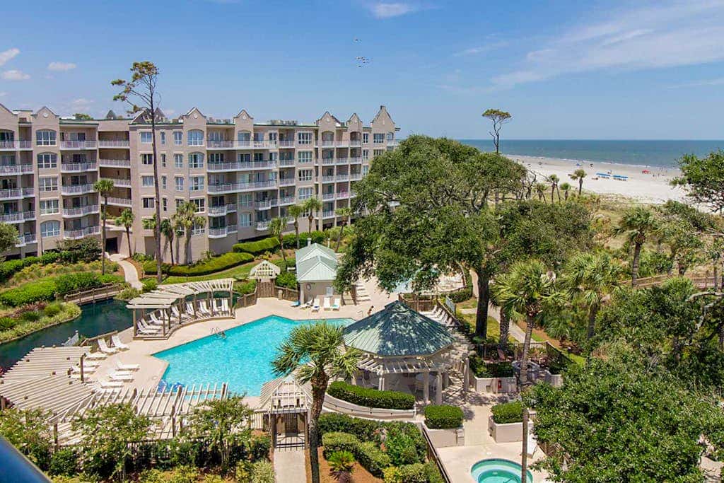 Stunning beach condo with two ocean-view balconies, shared pool & hot tub