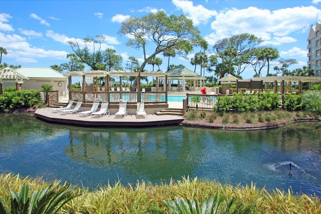 Stunning beach condo with two ocean-view balconies, shared pool & hot tub