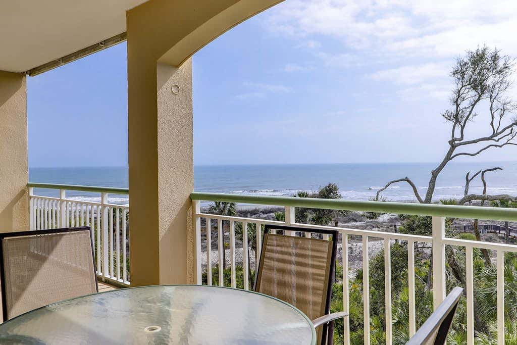 Sunlit Oceanfront Condo with Two Balconies, Wet Bar, Beach Views & WiFi