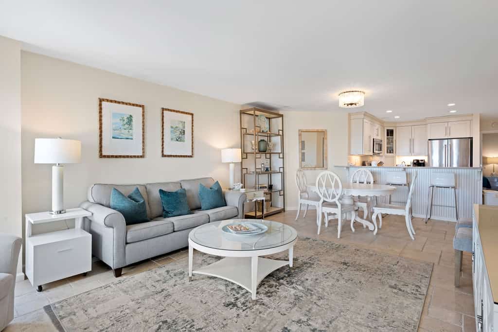 Beach-view 4th-floor condo with balcony, outdoor pool, elevator, BBQ area, W D
