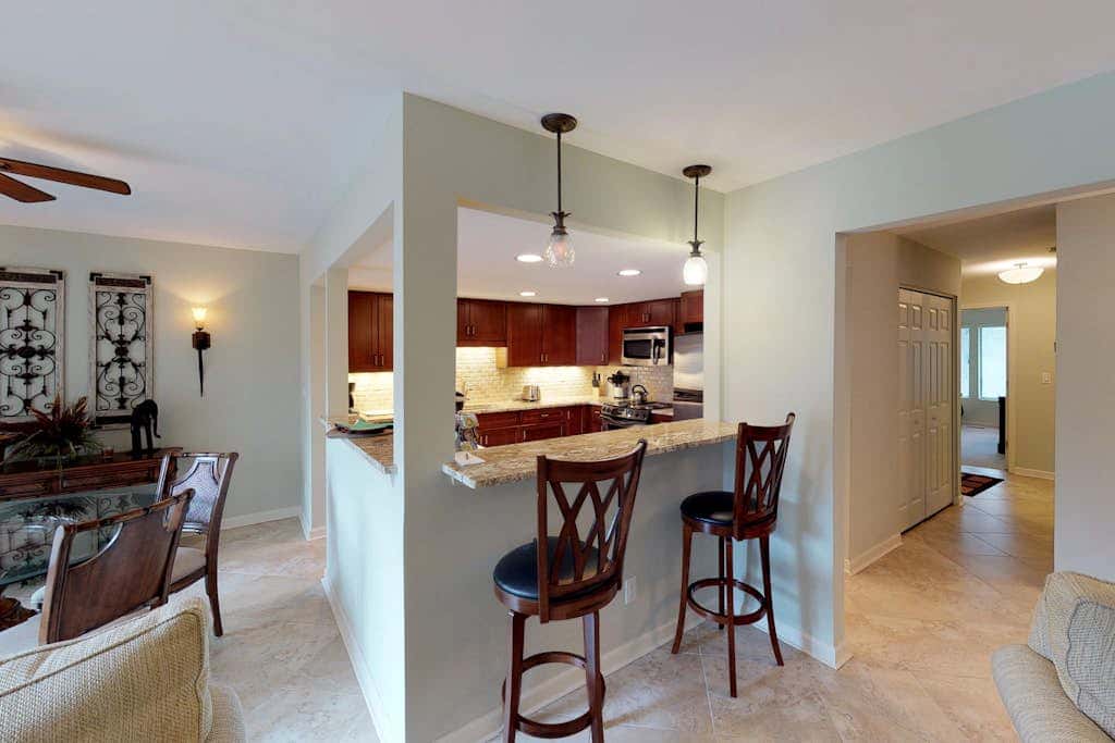 Lagoon-View Condo with Private Deck, Shared Pool & Easy Beach Access