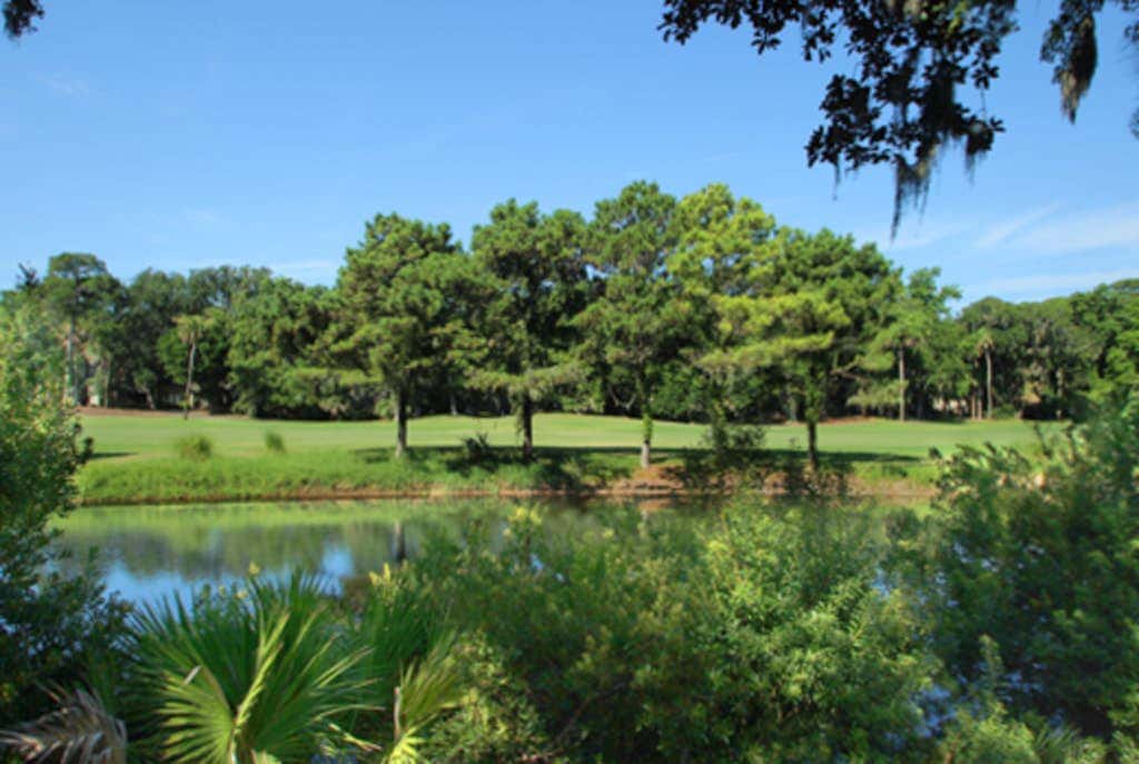 Lagoon-View Condo with Private Deck, Shared Pool & Easy Beach Access