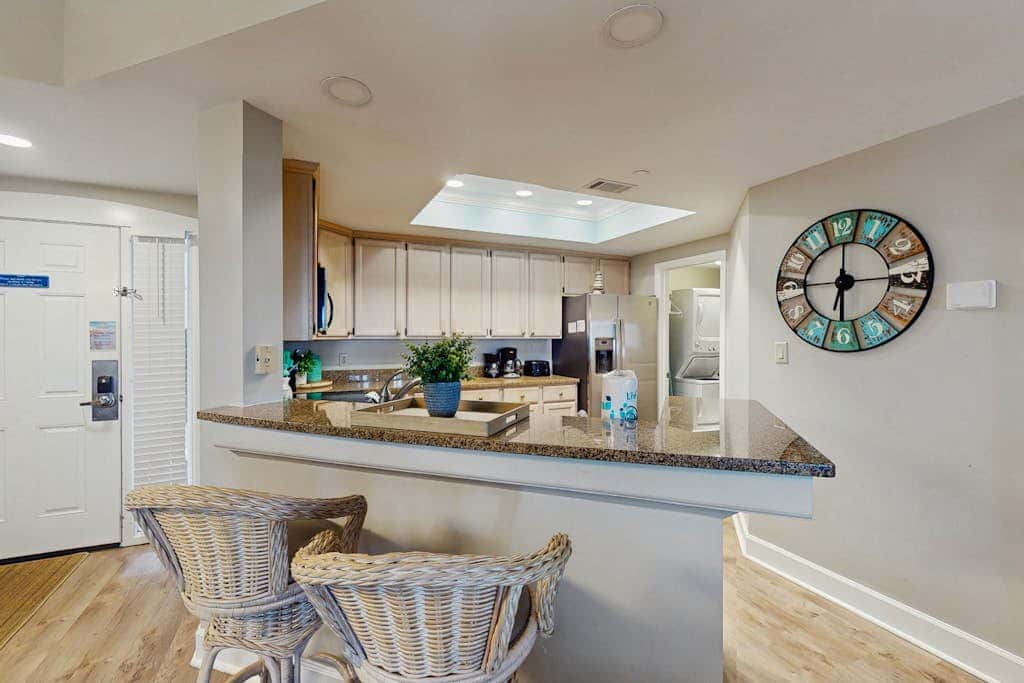 Spacious updated oceanfront condo with shared pools,  hot tub & beach access