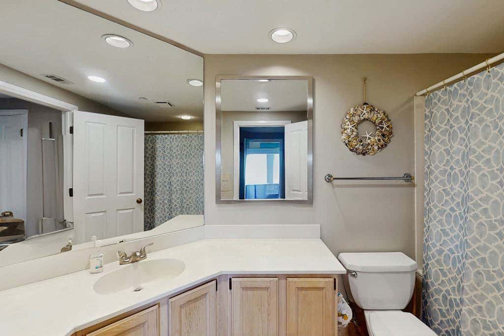 Spacious updated oceanfront condo with shared pools,  hot tub & beach access