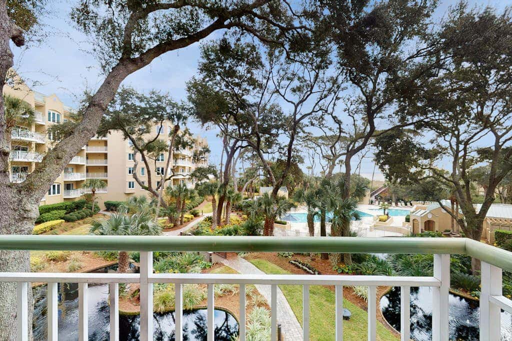Spacious updated oceanfront condo with shared pools,  hot tub & beach access