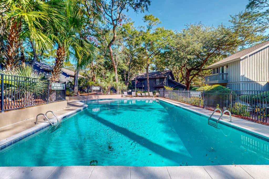 Comfortable two-story Villa with beach access, shared pool, private deck, and washer dryer
