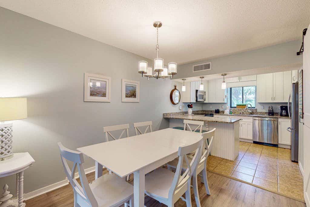 Comfortable two-story Villa with beach access, shared pool, private deck, and washer dryer