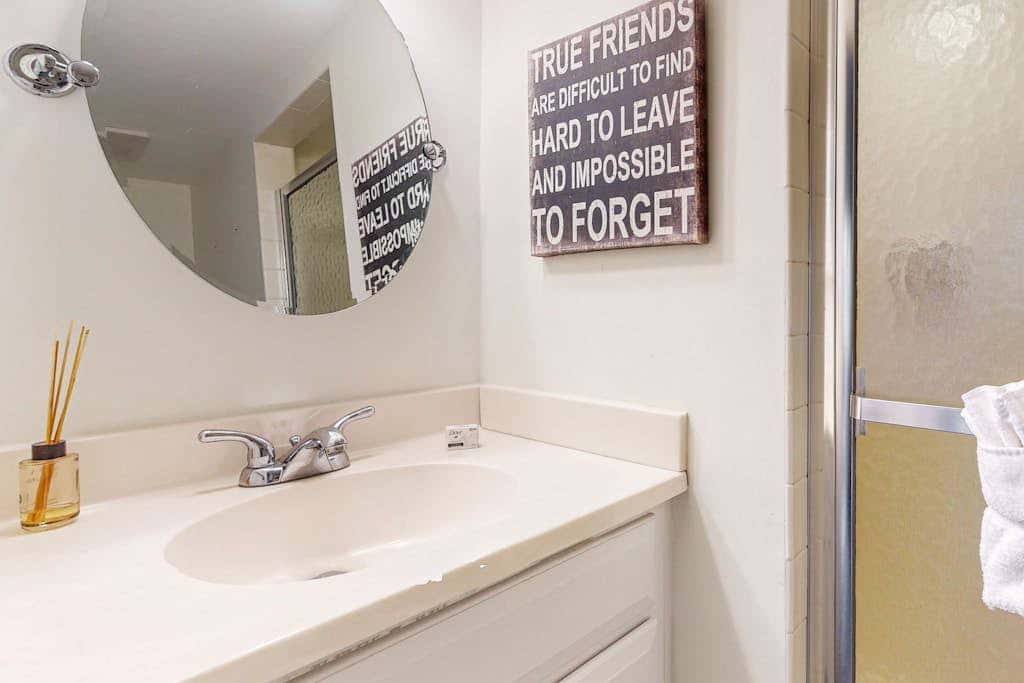 Comfortable two-story Villa with beach access, shared pool, private deck, and washer dryer