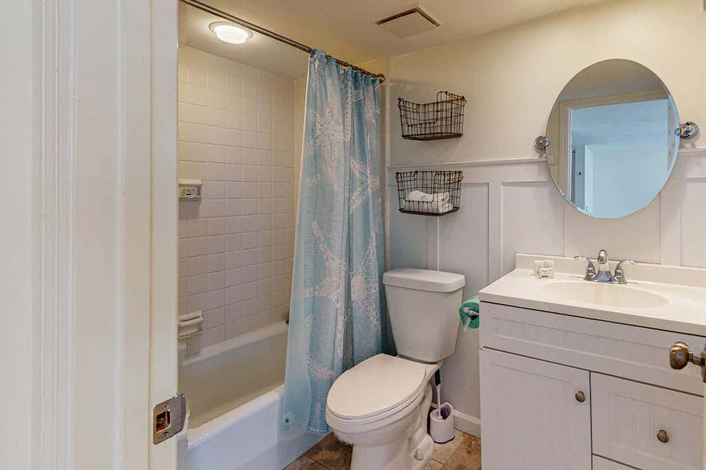 Comfortable two-story Villa with beach access, shared pool, private deck, and washer dryer