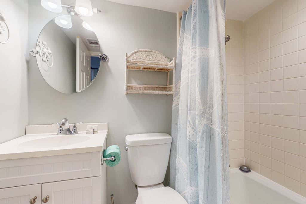 Comfortable two-story Villa with beach access, shared pool, private deck, and washer dryer