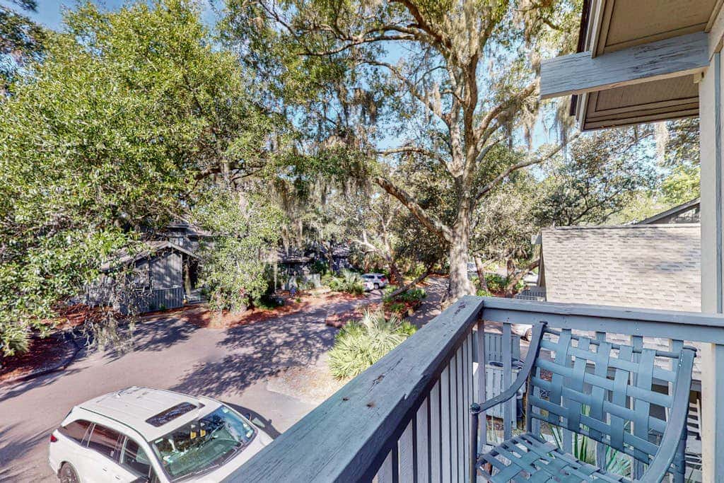Comfortable two-story Villa with beach access, shared pool, private deck, and washer dryer