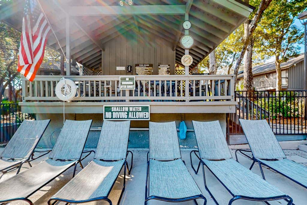 Comfortable two-story Villa with beach access, shared pool, private deck, and washer dryer