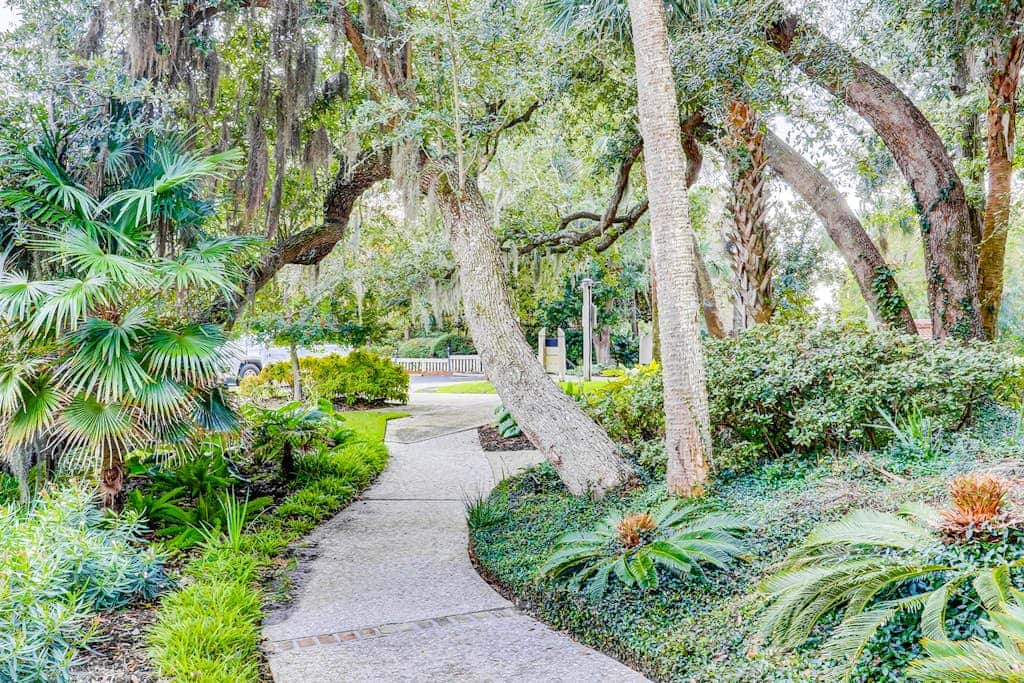 Comfortable two-story Villa with beach access, shared pool, private deck, and washer dryer