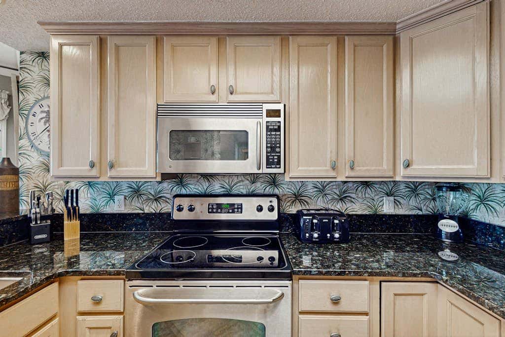 Waterfront Condo with Ocean Views, Shared Pool, Hot Tub, and Covered Balcony
