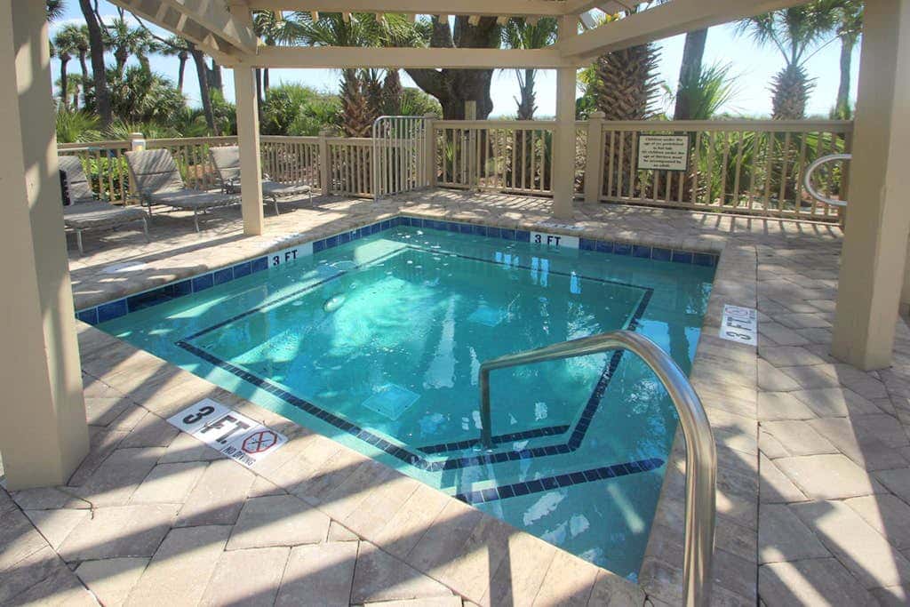 Waterfront Condo with Ocean Views, Shared Pool, Hot Tub, and Covered Balcony