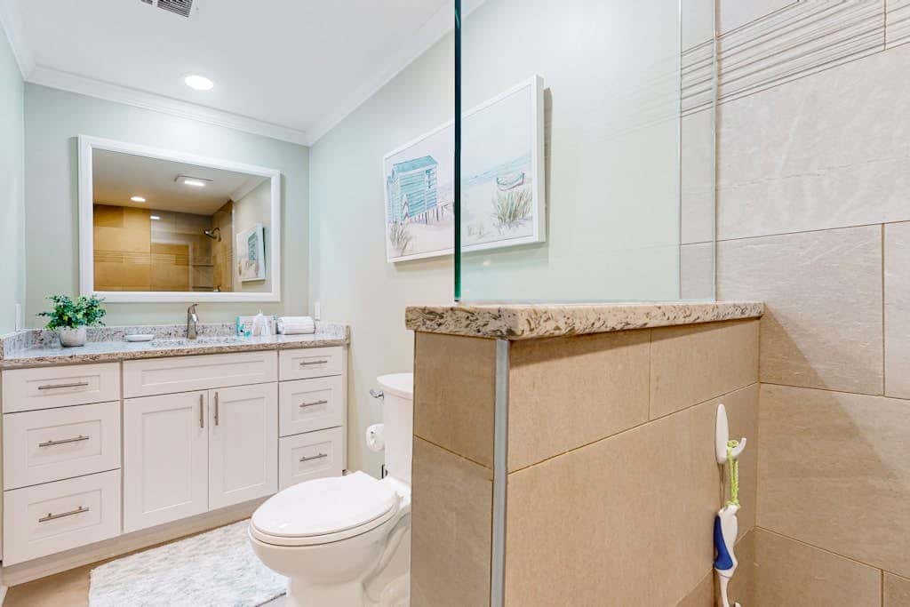 Inviting villa with pool, tennis, & balcony - close beach access