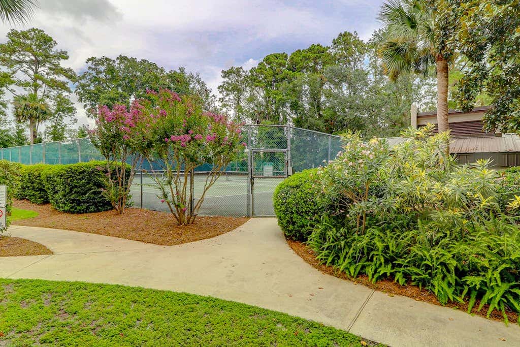 Inviting villa with pool, tennis, & balcony - close beach access