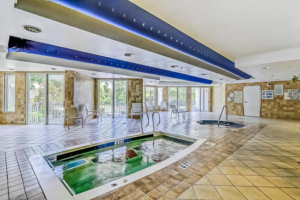Oceanfront condo with pools, hot tubs, fitness room, & central AC