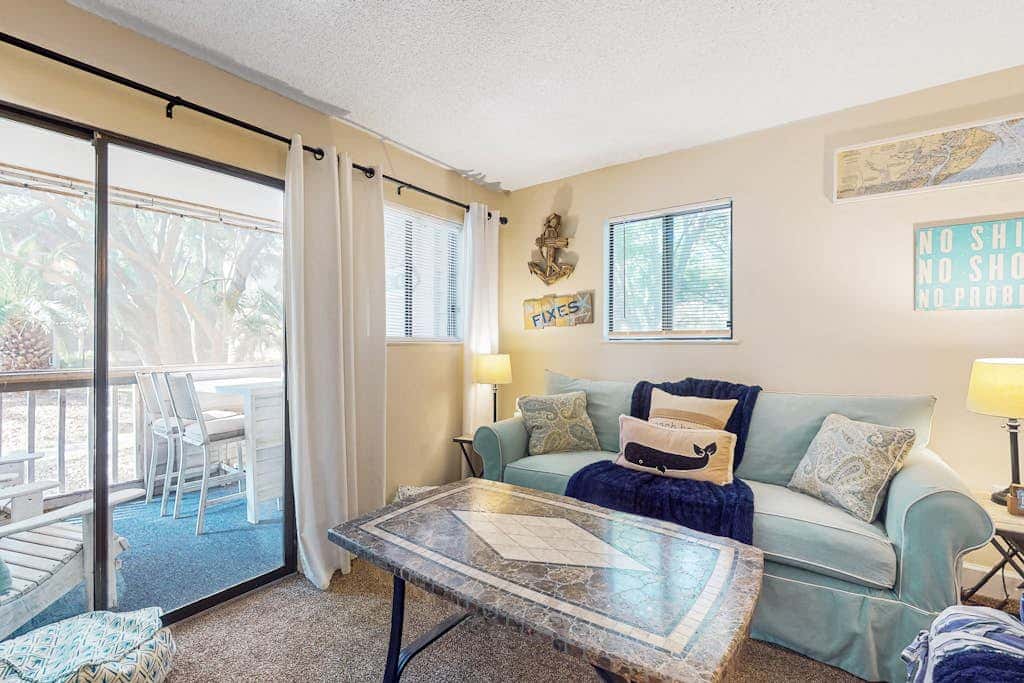 Villa by the beach with heated pools, hot tub, patio, tennis, central AC, & WD