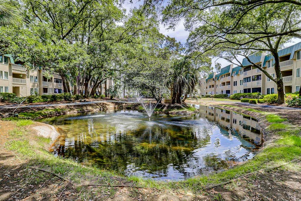 Villa by the beach with heated pools, hot tub, patio, tennis, central AC, & WD