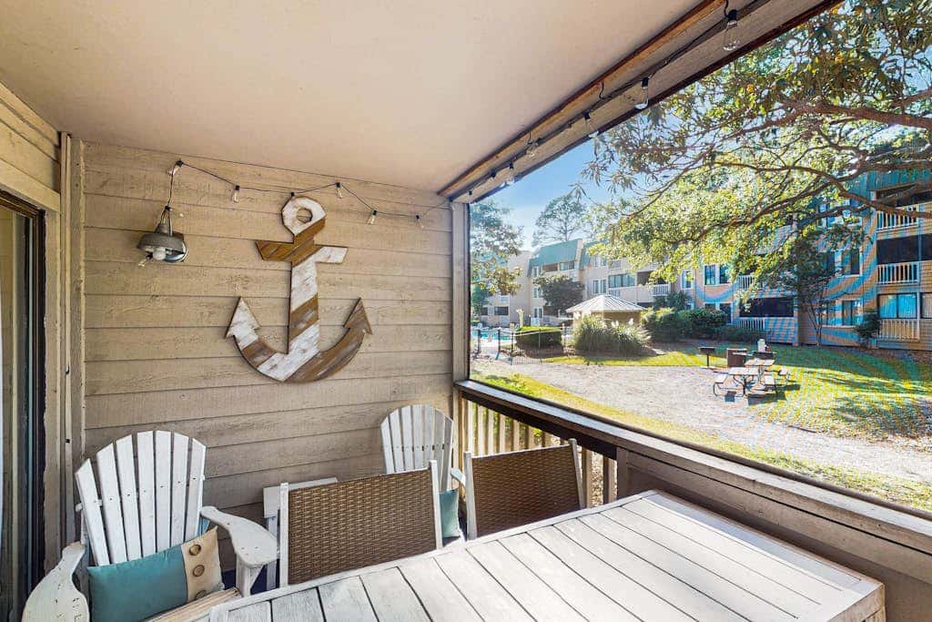 Villa by the beach with heated pools, hot tub, patio, tennis, central AC, & WD