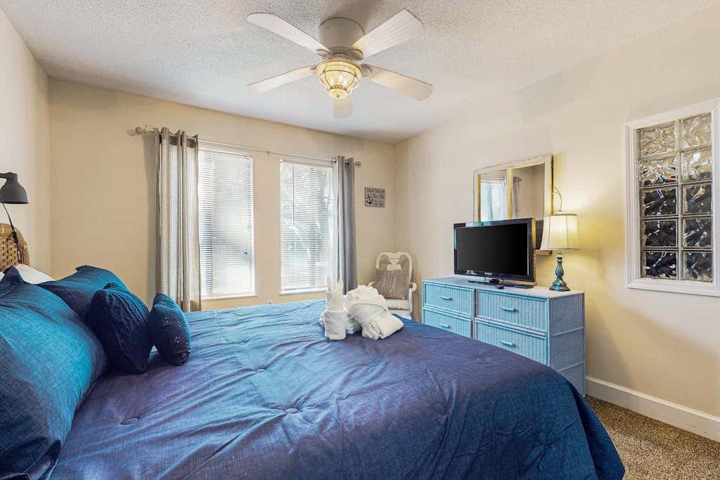 Villa by the beach with heated pools, hot tub, patio, tennis, central AC, & WD