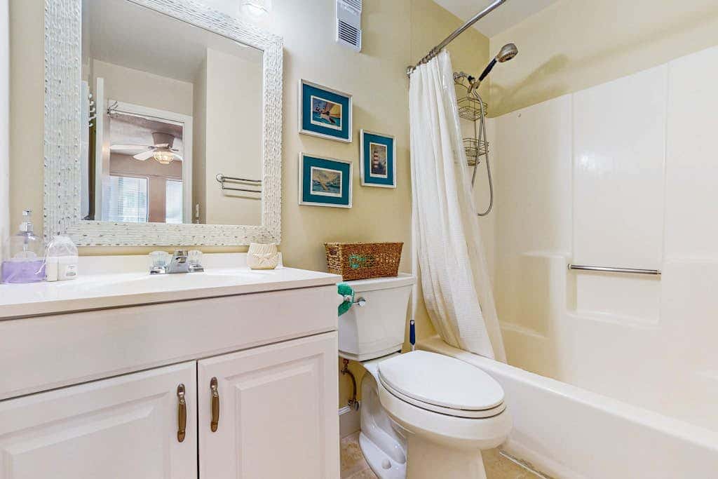 Villa by the beach with heated pools, hot tub, patio, tennis, central AC, & WD