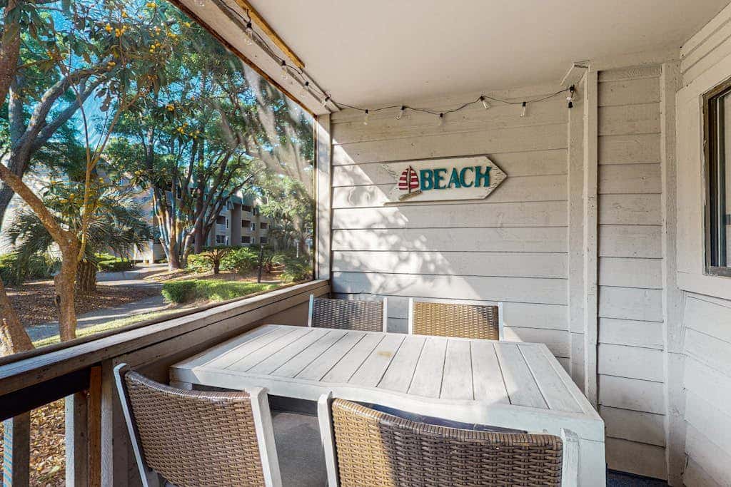 Villa by the beach with heated pools, hot tub, patio, tennis, central AC, & WD
