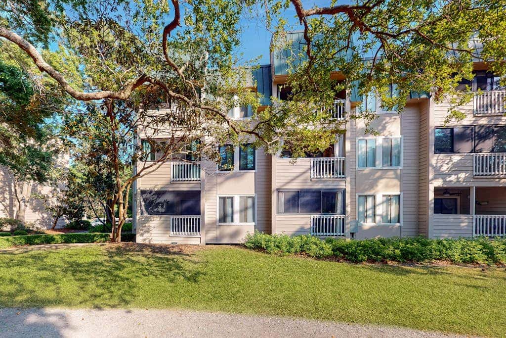 Villa by the beach with heated pools, hot tub, patio, tennis, central AC, & WD