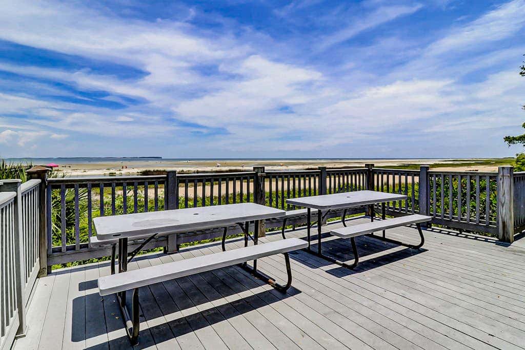 Villa by the beach with heated pools, hot tub, patio, tennis, central AC, & WD