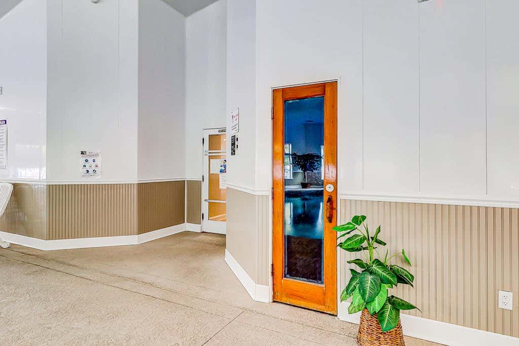 Villa by the beach with heated pools, hot tub, patio, tennis, central AC, & WD