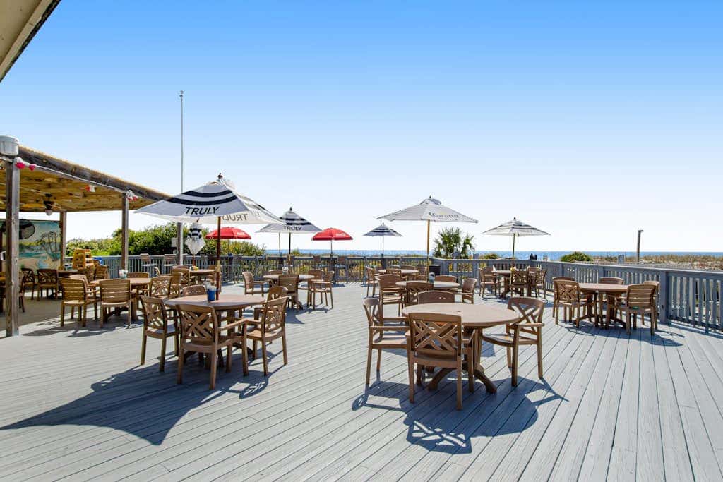 Newly renovated beachfront condo with pool, tennis, restaurants, gym, & balcony
