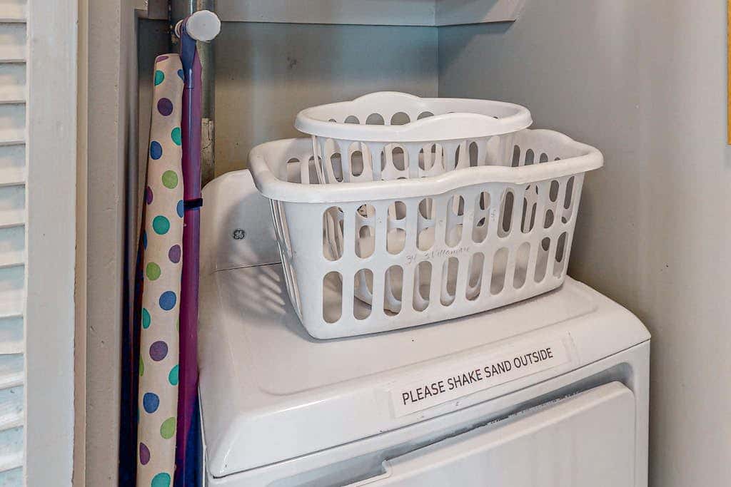 First Floor Condo near the beach with beach gear, washer and dryer, and pool